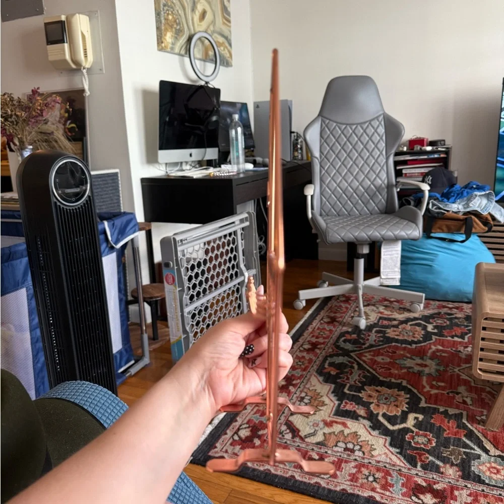 Rose gold jewelry holder with earring holes